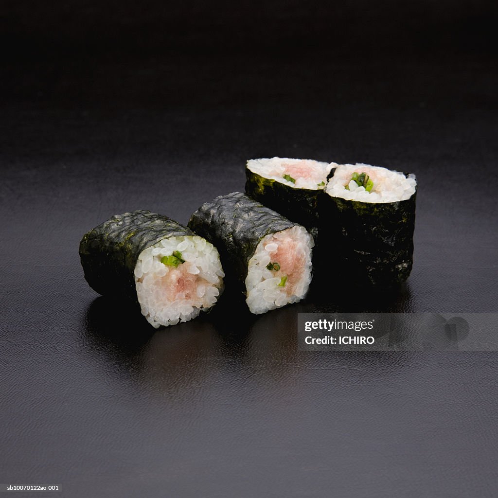 Negitoromaki Sushi on black background