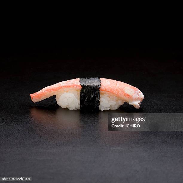 zuwaigani nigiri sushi on black background - chionoecetes opilio stock pictures, royalty-free photos & images