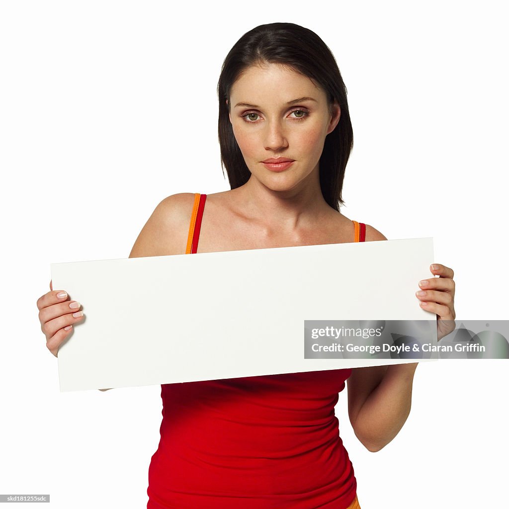 Woman holding a blank card