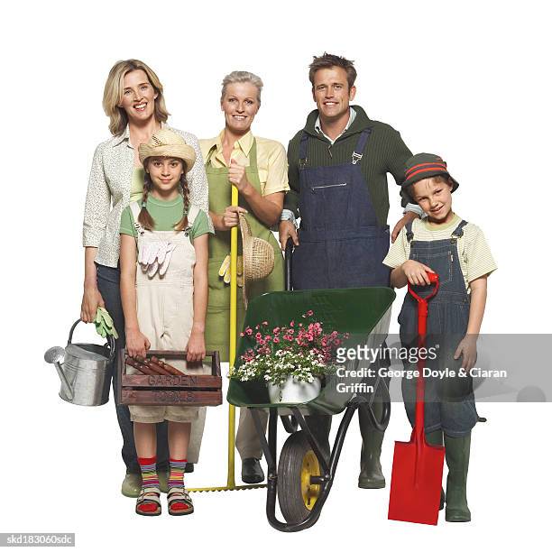 portrait of a three generation family gardening - pour spout stock pictures, royalty-free photos & images