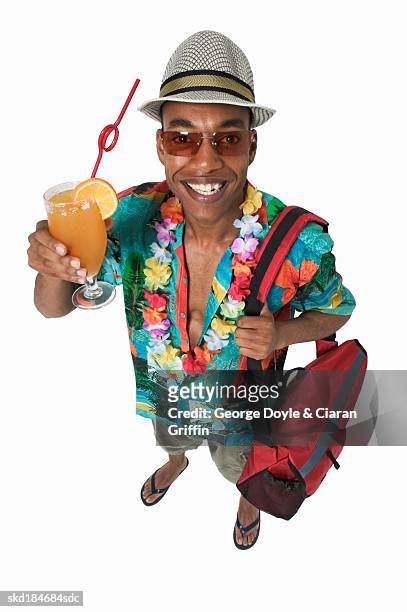 portrait of man holding cocktail and bag - red flip flops isolated stock pictures, royalty-free photos & images