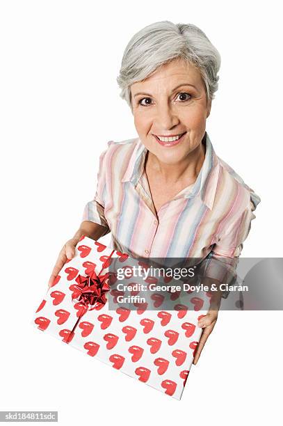 portrait of woman holding gift - wrap blouse stock pictures, royalty-free photos & images