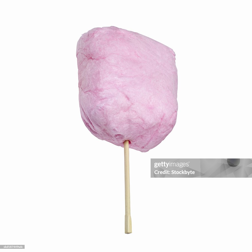 Close up of a stick of candy floss