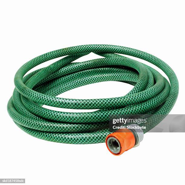 close up of a water hose - wasserschlauch stock-fotos und bilder