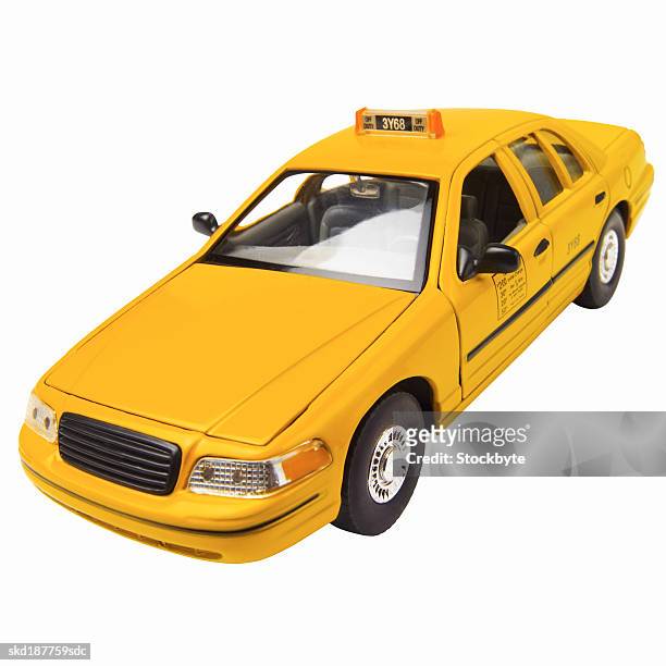 close up of a model new york taxi car - taxi amarillo fotografías e imágenes de stock