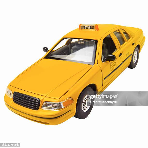 close up of a model new york taxi car - yellow taxi foto e immagini stock