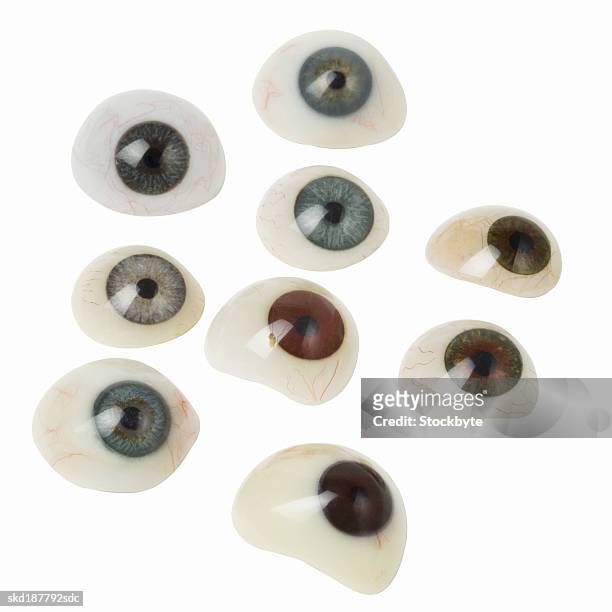 close up of a group of glass eyes - occhio di vetro foto e immagini stock