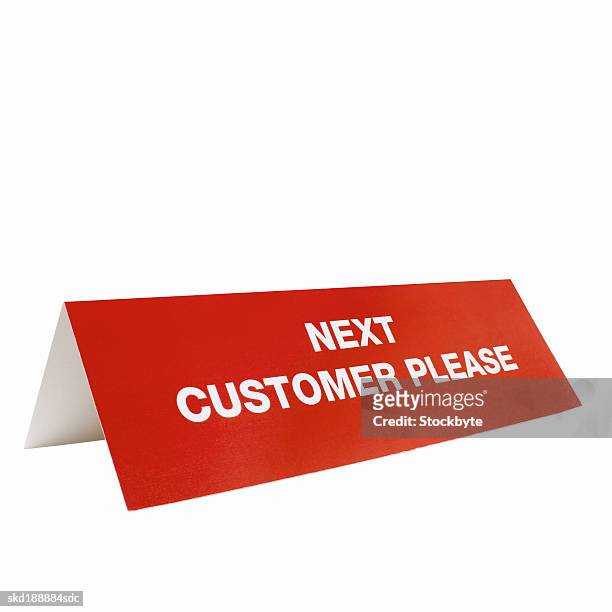close-up of a next customer please sign - next stockfoto's en -beelden
