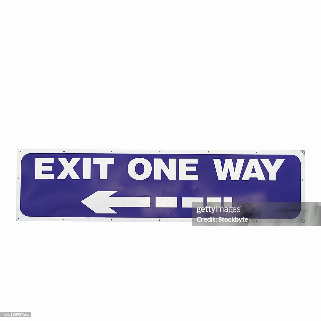 Close up of an 'exit one way' sign