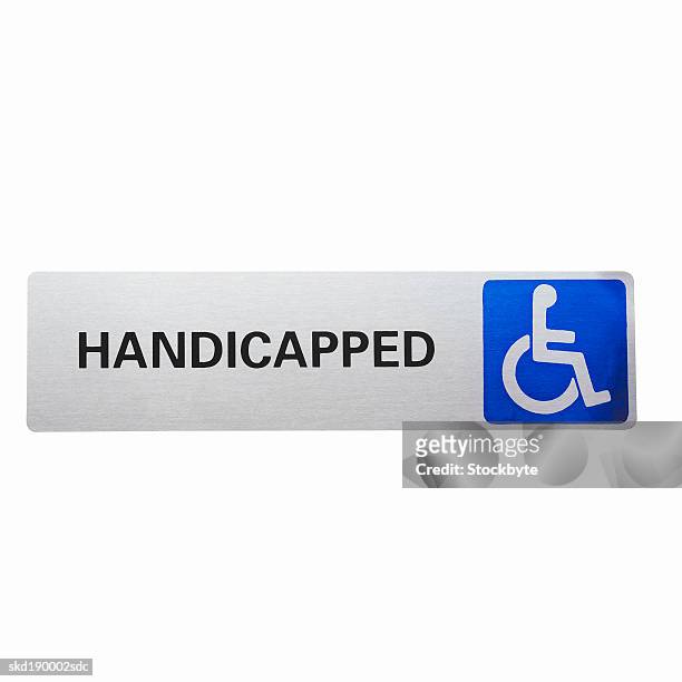 close up of a handicapped sign - western script stock pictures, royalty-free photos & images