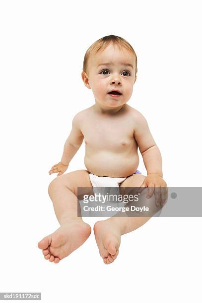 portrait of a baby (6-12) - only baby boys stock pictures, royalty-free photos & images