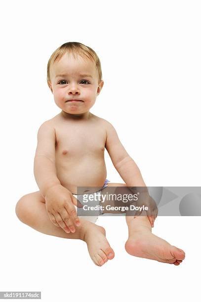 front view portrait of a baby boy (12-18 months) sitting - only baby boys stock pictures, royalty-free photos & images
