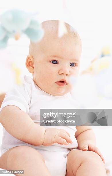 front view portrait of baby girl (6-12 months) - only baby girls stock pictures, royalty-free photos & images