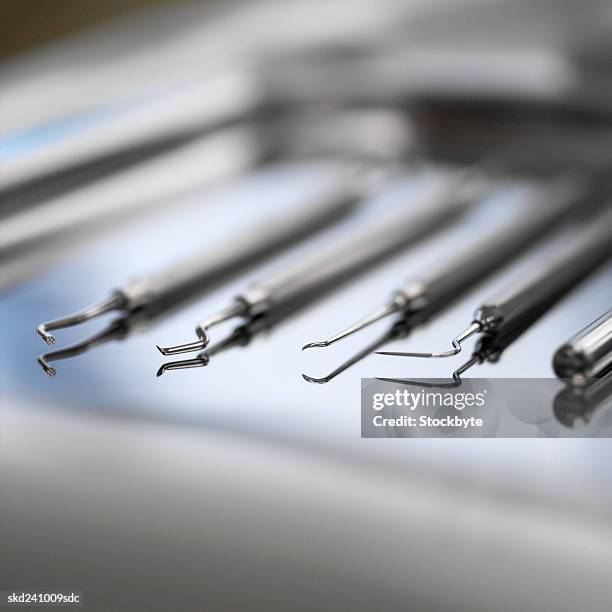 close-up of dental tools - rimotore di placca foto e immagini stock