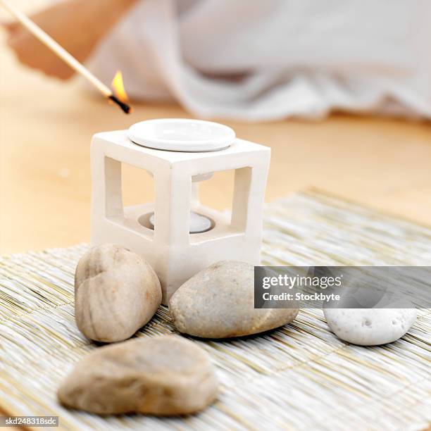 match about to light a incense burner - about stock pictures, royalty-free photos & images