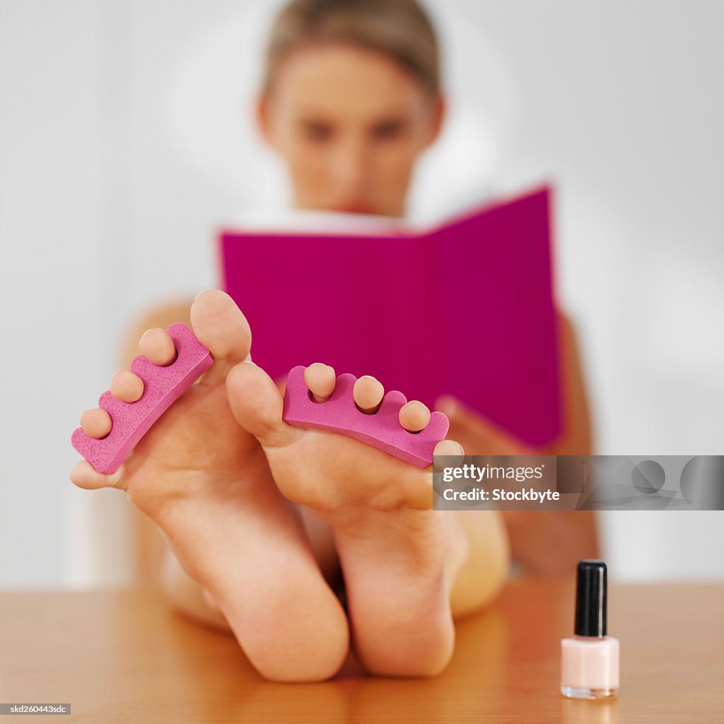 Close-up of a woman's toenails drying