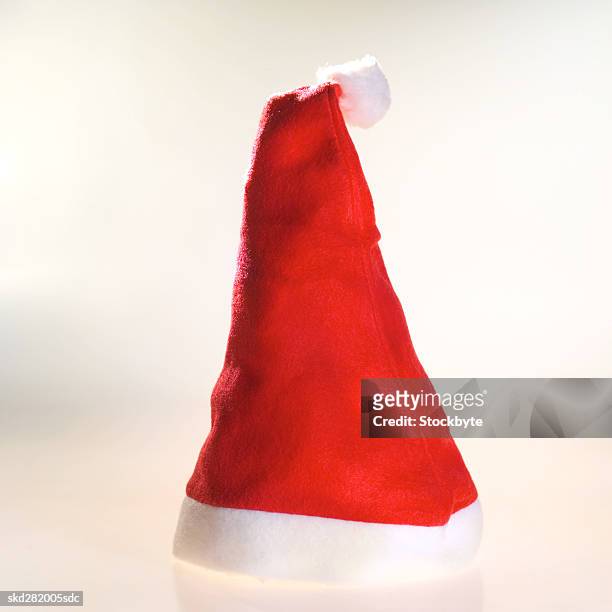 close-up of a santa hat - hat stock-fotos und bilder