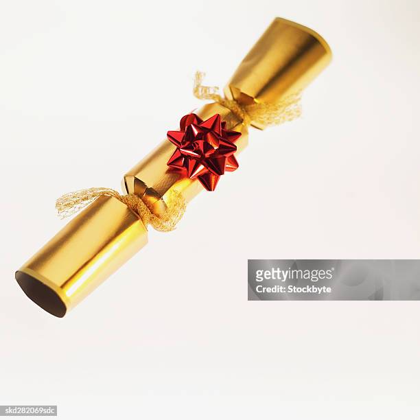 close-up of a christmas cracker - christmas crackers stock pictures, royalty-free photos & images