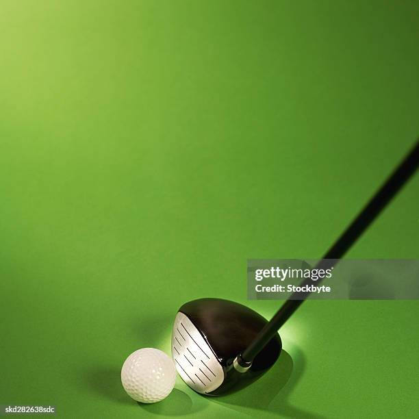 close-up of a golf ball and golf club - golf club - fotografias e filmes do acervo