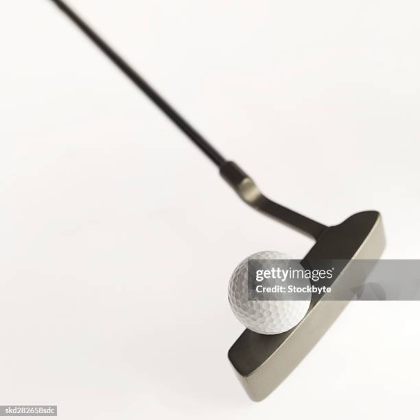 close-up of a golf ball and golf club - golf club - fotografias e filmes do acervo