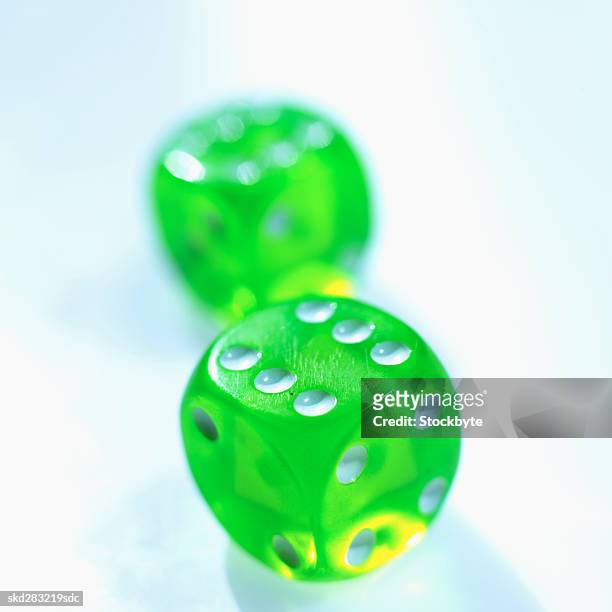 close-up of two dices - entertainment best pictures of the day january 06 2016 stockfoto's en -beelden