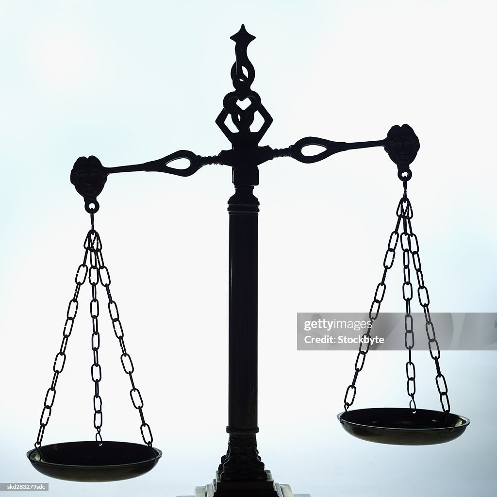 Close-up of the scales of justice