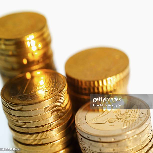 close-up of euro coins of various denominations - fünfzig euro cent stock-fotos und bilder