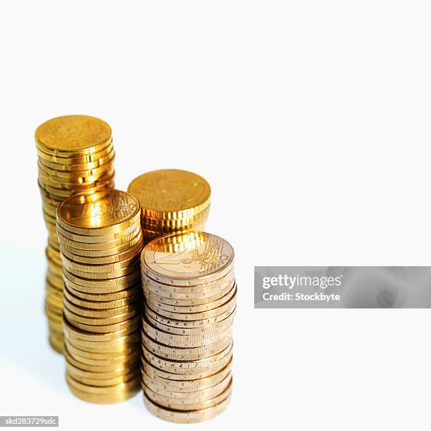 close-up of euro coins of various denominations - zwei euro münze stock-fotos und bilder