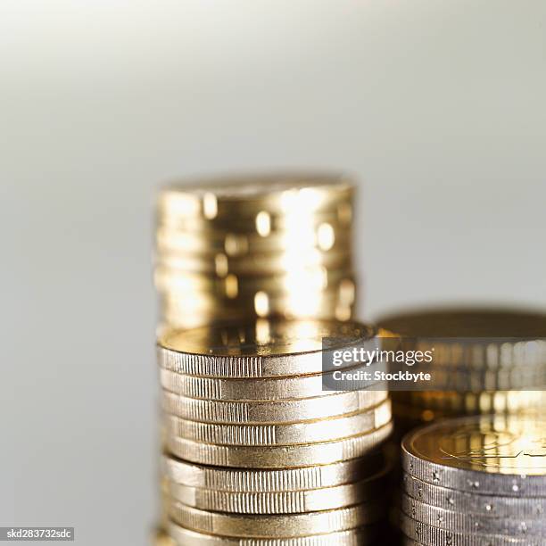 close-up of euro coins of various denominations - zwei euro münze stock-fotos und bilder