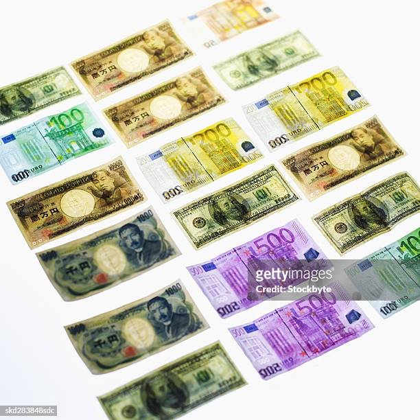 close-up of various currency bank notes - nota de dez mil yens - fotografias e filmes do acervo