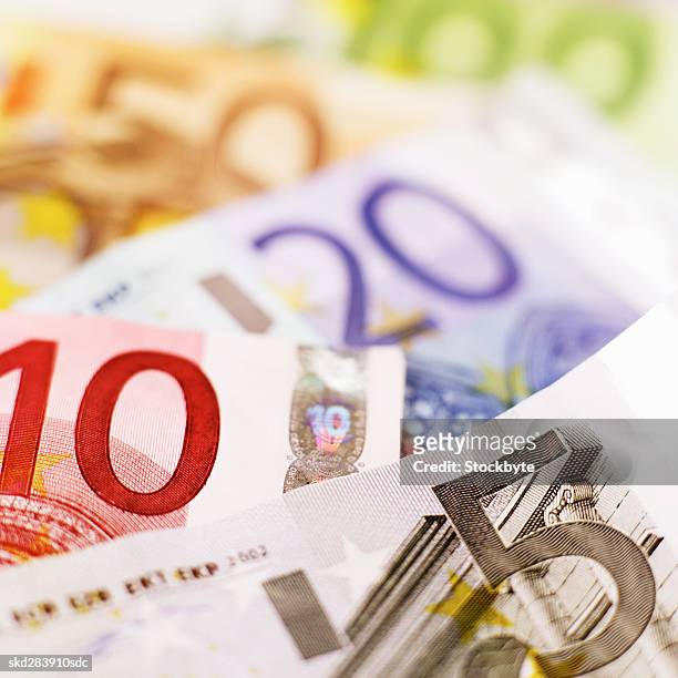 close-up of various euro bank notes - twenty euro note stock pictures, royalty-free photos & images