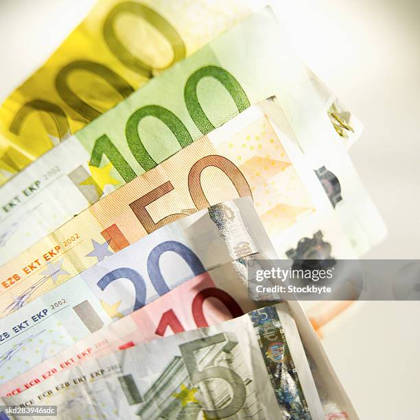 close-up of various euro bank notes - twenty euro note stock pictures, royalty-free photos & images