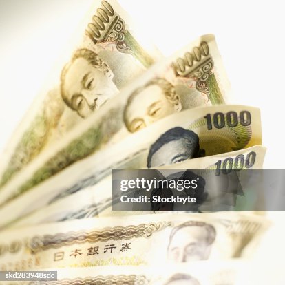 Close-up of various Japanese yen bank notes Close-up of various Japanese yen bank notes