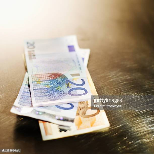 close-up of various euro bank notes - twenty euro banknote stock pictures, royalty-free photos & images