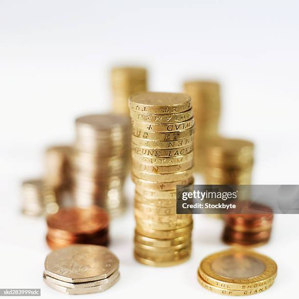 close-up of stacks of u.k.. coins - two pound coin stock pictures, royalty-free photos & images