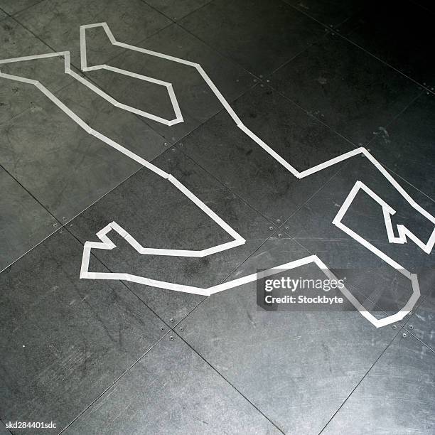 close-up of chalk outline of body - chalk outline stock-fotos und bilder