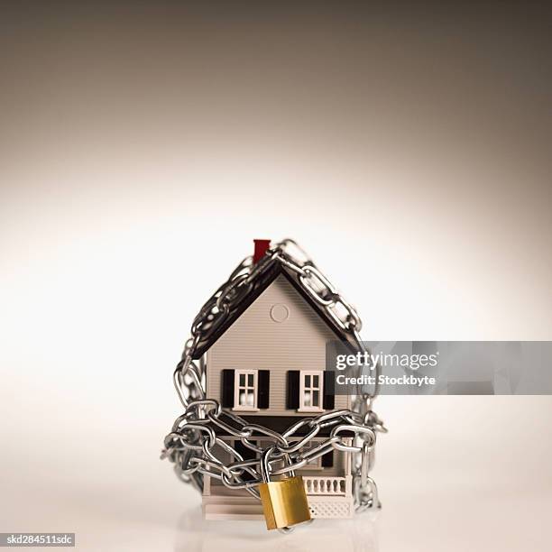 house chained and padlocked - modell stock pictures, royalty-free photos & images