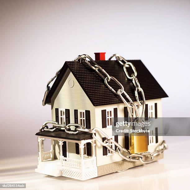 house chained and padlocked - modell stock pictures, royalty-free photos & images