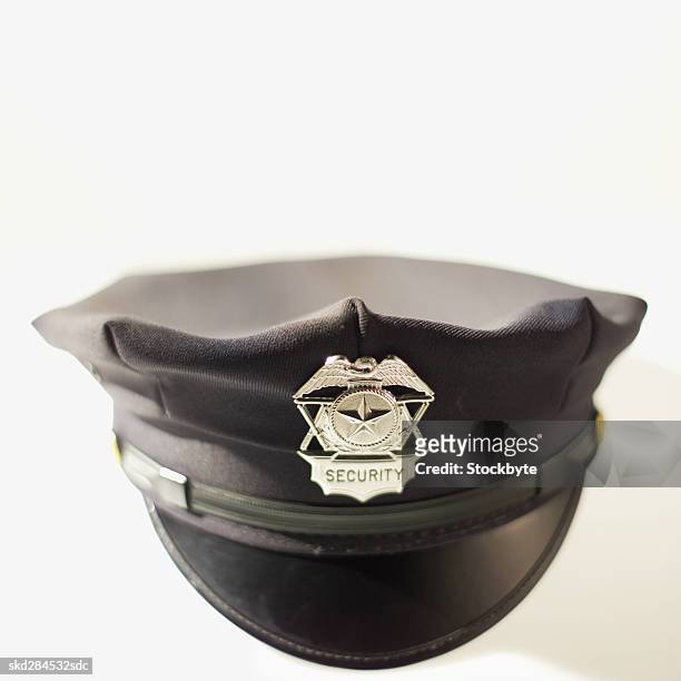 close-up of police hat - hat stock-fotos und bilder