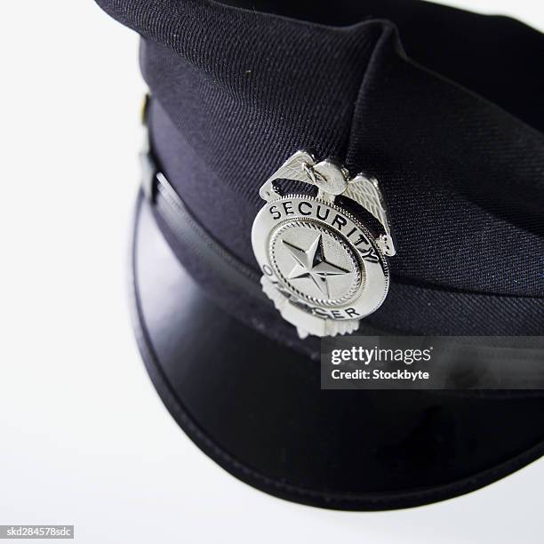 close-up of police hat - police hat stock pictures, royalty-free photos & images