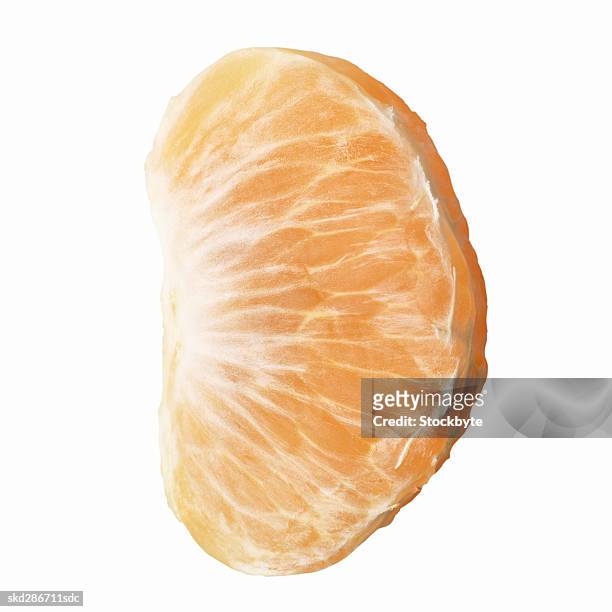 close-up of a slice of an orange - slice stock pictures, royalty-free photos & images