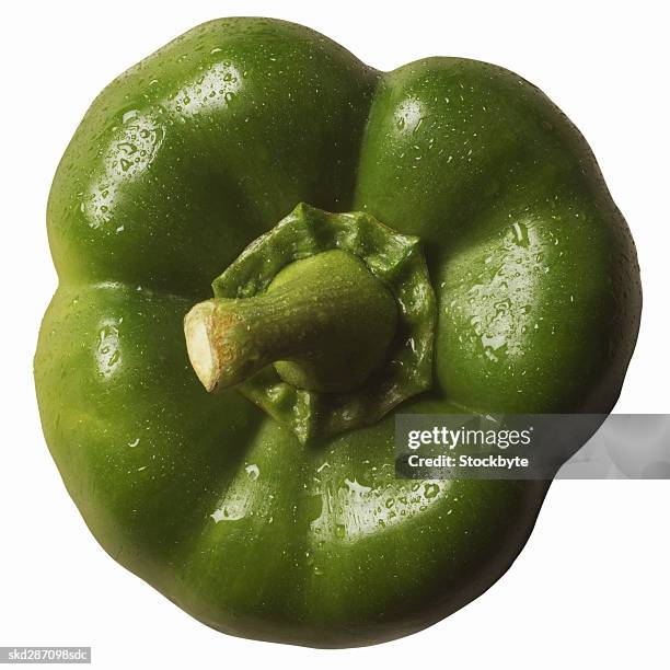 close-up of a green bell pepper - bell stock-fotos und bilder