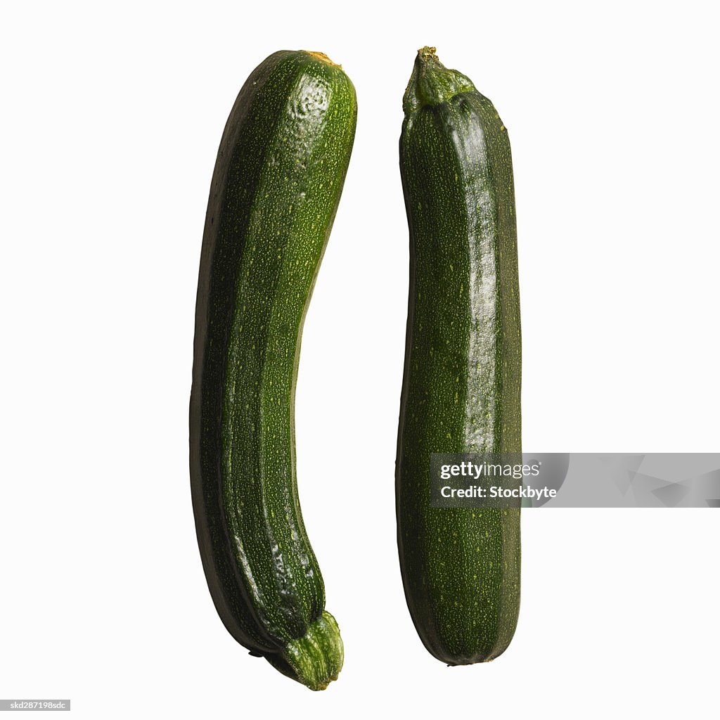 Close-up of two courgettes