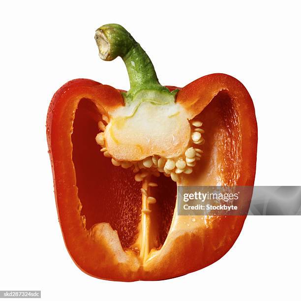 close-up of half a red bell pepper - bell foto e immagini stock