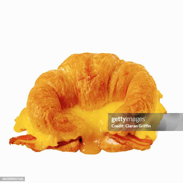 close-up of a breakfast croissant - bacon isolated stock pictures, royalty-free photos & images