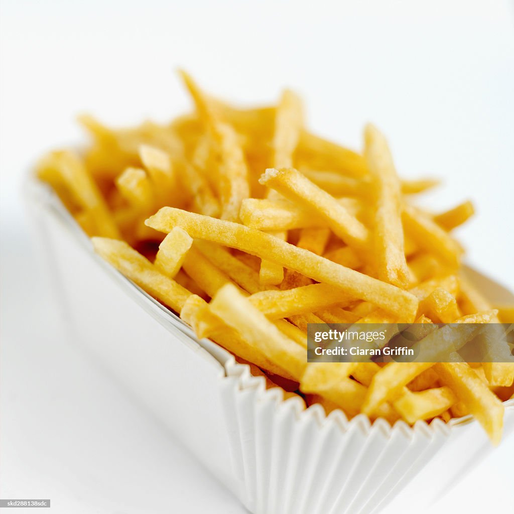 Close-up of a carton of french-fries