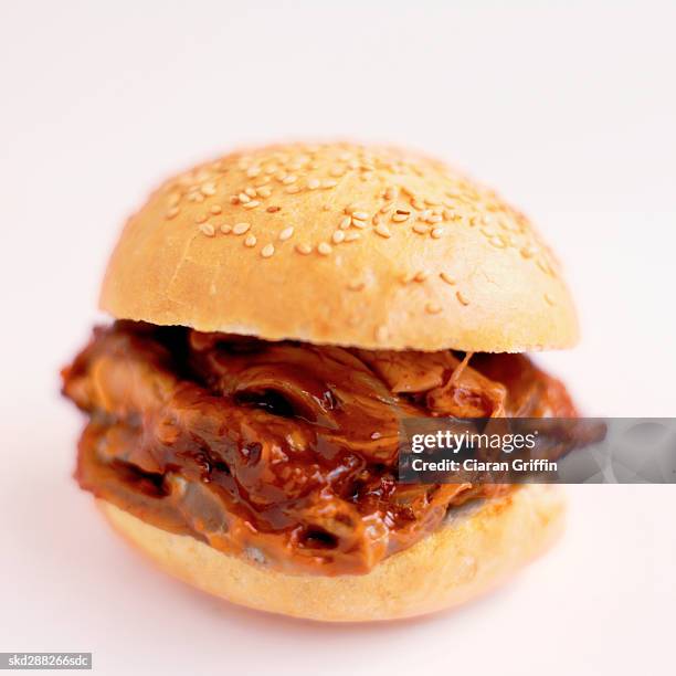 close-up of barbecue beef on kaiser roll - roll on bildbanksfoton och bilder