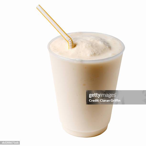 close-up of vanilla milkshake - vanilla milkshake isolated stock pictures, royalty-free photos & images