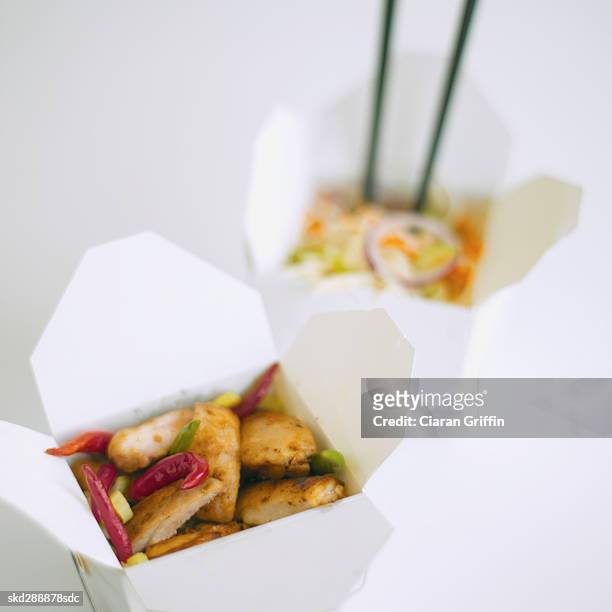 close-up of two cartons of chinese food - gen z studio brats premiere of chicken girls arrivals stockfoto's en -beelden