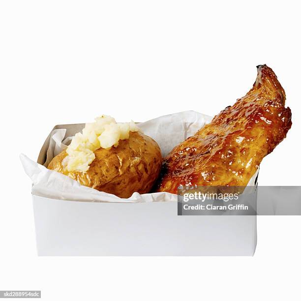 close-up of a carton of mashed potato and spare ribs - mashed stock pictures, royalty-free photos & images